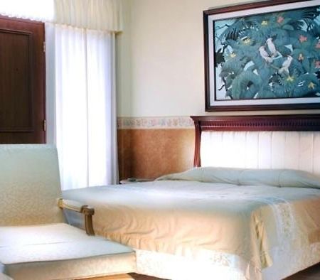 Umm Inn Hotel Malang Habitación foto